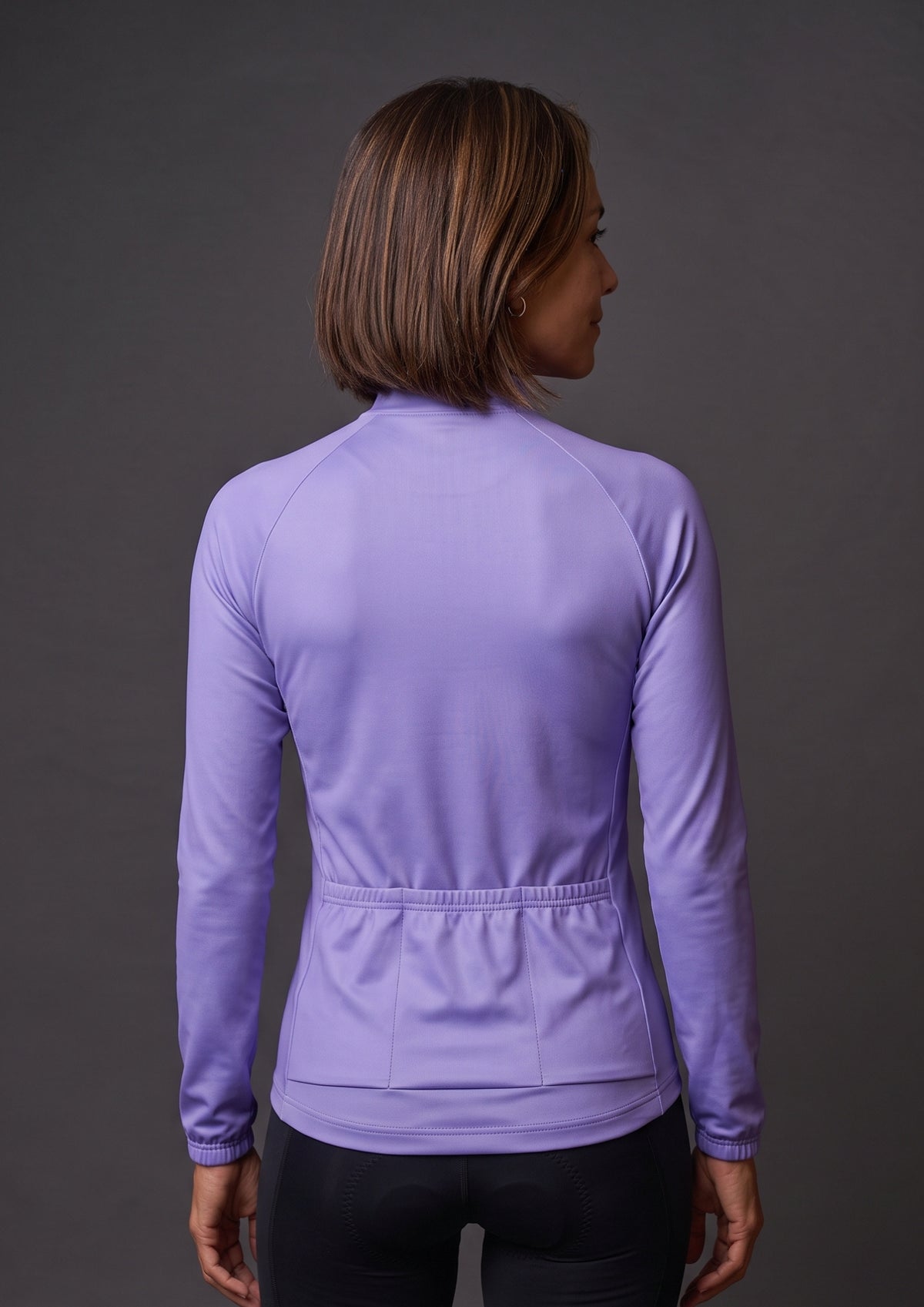 Camisa de Ciclismo Feminina CPM Manga Longa Lilás, vista de costas, bolsos traseiros